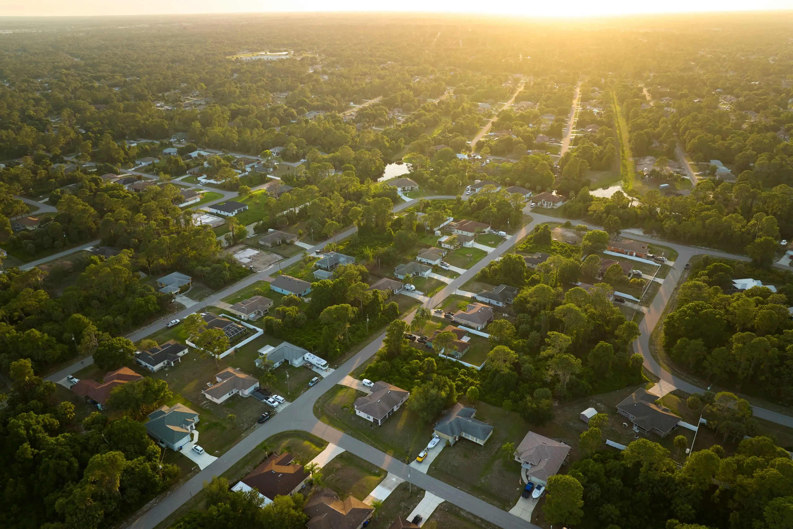 Aerial view of a South Florida neighborhood at sunset