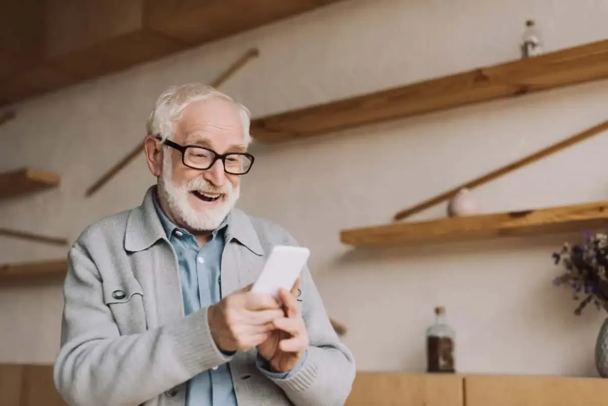 A homeowner reviewing a cash offer on a smartphone